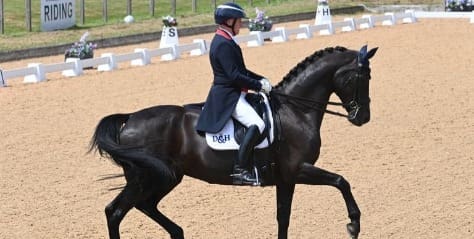 Richard Davison doing dressage on black horse
